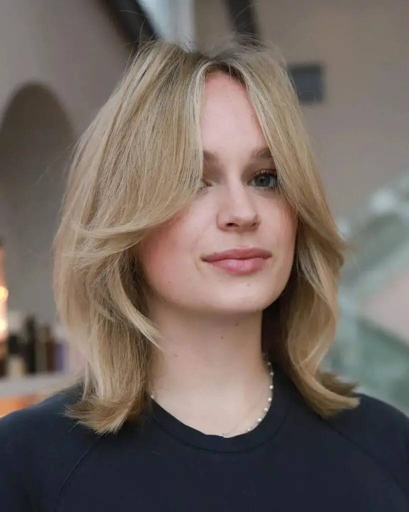 Achieve Volume and Style: Voluminous Face-Framing Lob