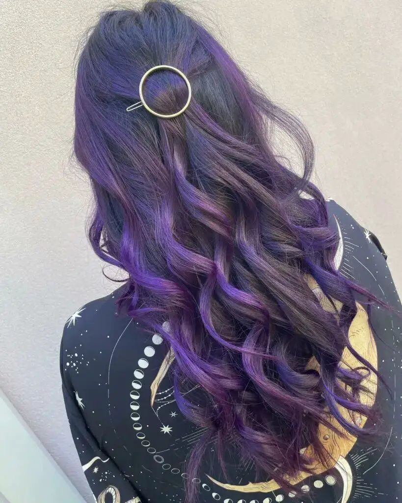 Highlighting Elegance: Dark Brown Hair with Purple Touches