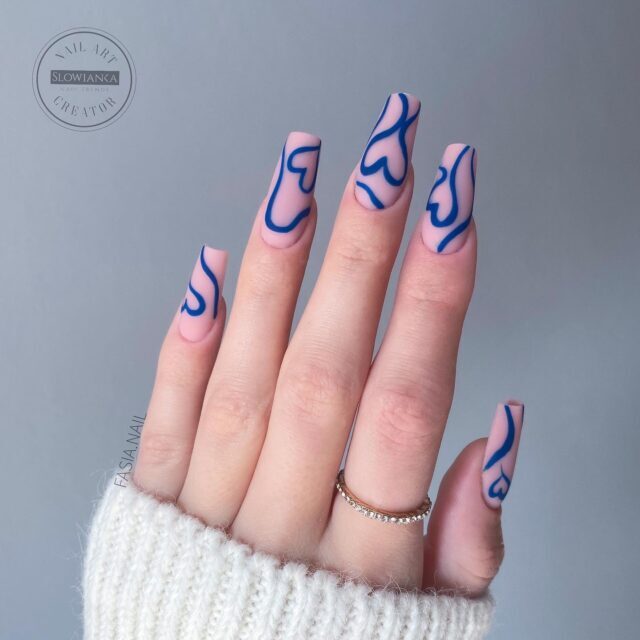 Faustyna's Blue Heart Swirls: Captivating February Nail Designs