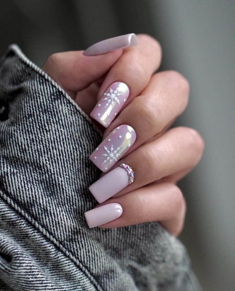 Pastel Pink Nails with Chrome Accent and Snowflake Details