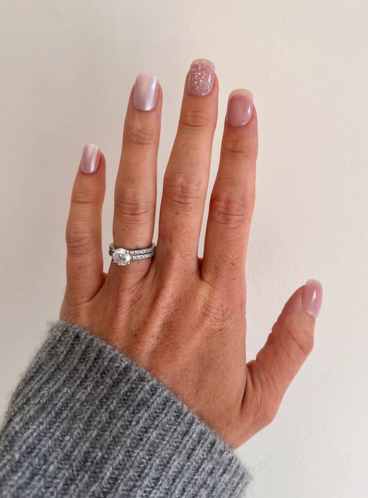 Metallic Pink Nails with Glitter Polish and Nude Accents