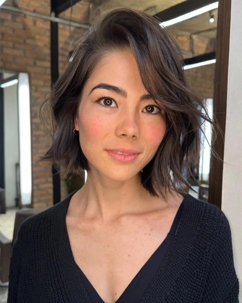 Tousled Bob with a Deep Side Part: Effortlessly Chic