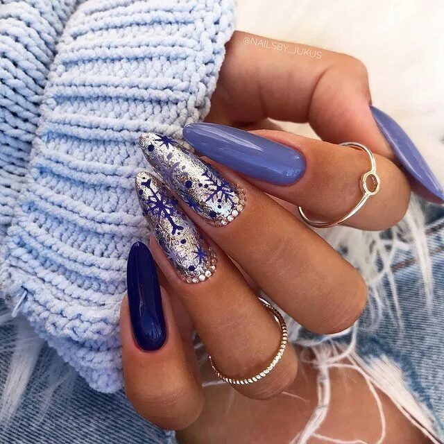 Winter Nail Designs | Blue and Silver Nails Featuring Delicate Snowflake Details