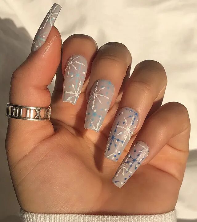 Winter Nail Designs | Frosty Nails Enhanced with Blue and White Snowflake Art