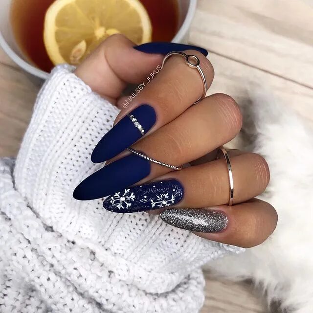 Winter Nail Designs | Striking Blue Nails Sparkling with Accent and Snowflake Art