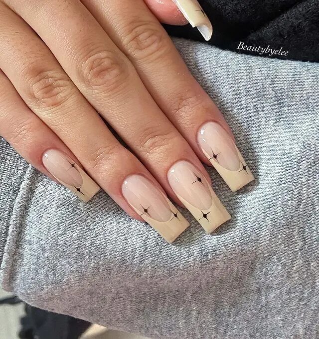 Winter Nail Designs | Nude French Tips with Starlight for a Subtle and Elegant Style