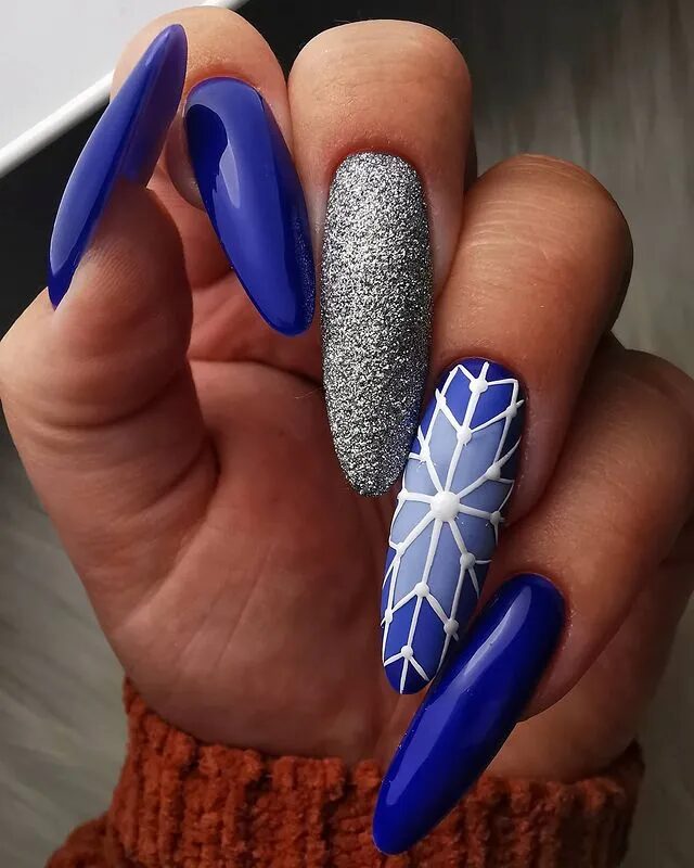 Winter Nail Designs | Blue Winter Nails Adorned with Sparkling Snowflake Art