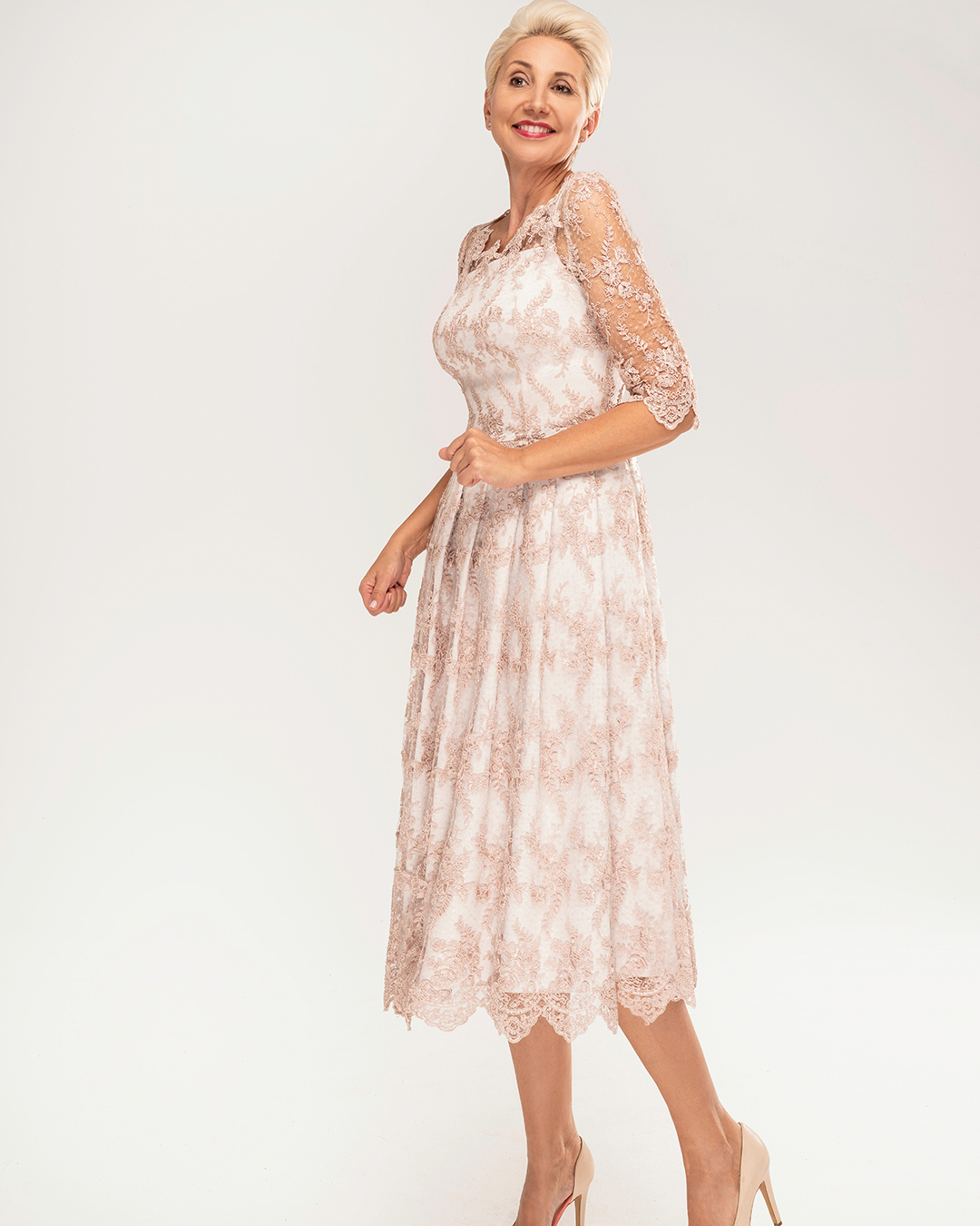 mother of the bride dresses lace with sleeves tea length shutterstock