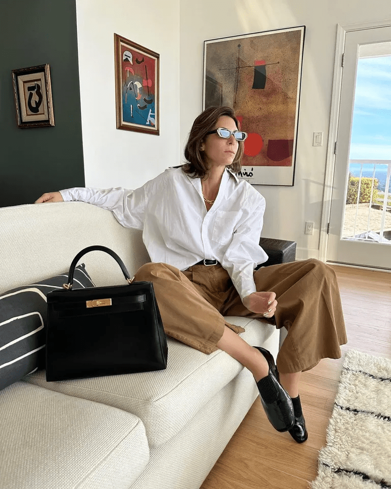 White Shirt with Wide-Leg Trousers and Structured Bag